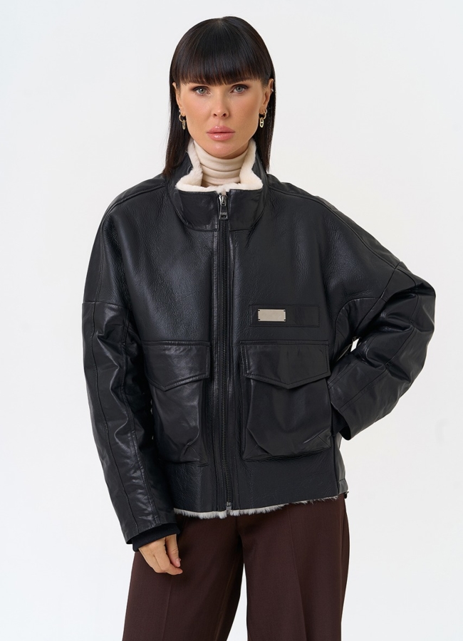 Женский пуховик из натуральной кожи с отделкой из овчины модель № 28577 меха малина